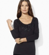 Glistening beading along the neckline adds feminine flourish to Lauren Ralph Lauren's soft cotton petite top.