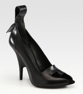 High-fashion leather style with an extended pull tab and a unique peep toe with a built-in toe ring and sculpted heel. Self-covered heel, 4Leather upperLeather lining and solePadded insoleImported