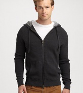 A layering favorite for those cold-weather days and nights, knitted in a thermal cotton with a textured, two-tone finish.Two-way zip frontAttached drawstring hoodFront kangaroo pocketsRibbed knit cuffs and hemCottonHand washImported