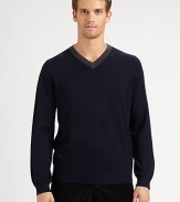 A smart v-neck sweater updated with ribbed detailing and standout contrast trim.V-neck with contrast ribbed trimLong sleeves with ribbed cuffsRibbed hemMerino woolHand wash or dry cleanImported