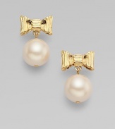 A feminine creation of luminous pearls suspended from sweet bows.12k goldplating Length, about 1¼ Post backs Imported