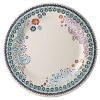 Sultana is a graphic and contemporary design in turquoise, orange, navy, and lavender inspired by laces of the Orient.