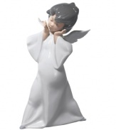 A guardian angel from Lladro, this gentle cherub wears a white robe and wondrous expression that puts everyone at ease.