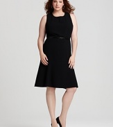 This Calvin Klein essential black dress flaunts a flirtatious flared skirt and belted waist for a ladylike silhouette.