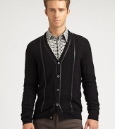 Cool-weather layering never looked so good, and adding this button-front cardigan is a sure-fire way to beat the chill in style; neatly woven in pure virgin wool with a sleek leather trim for a modern contrast.Button-frontRibbed knit cuffs and hemChest welt, hip flap pocketsRear ventAbout 37 from shoulder to hemPure virgin woolMachine washMade in Italy