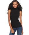 INC's sleeveless turleneck sweater is a layering basic for the season-- just add your favorite jacket or blazer!