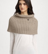 A plush, knit wool and cashmere topper with rolled collar in a cozy, cropped silhouette.About 15 X 1770% wool/30% cashmereDry cleanMade in Italy