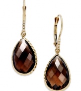 Take your look to the next level with the right amount of color. Pear-cut smokey topaz (10 ct. t.w.) adds the sparkle to these shining 14k gold earrings with diamond accents. Approximate drop: 1-1/4 inches.