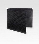 EXCLUSIVELY AT SAKS. Sophisticated with a sporty feel, in a classic leather logo stamped design.One billfold compartmentSix card slots4½ x 3½Made in Italy