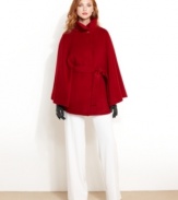 Turn up the volume with Ellen Tracy's wool-blend cape. A sash belt adds definition at the waist for a totally chic look.