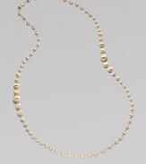 An elegant strand of brushed 18k yellow gold beads.18k yellow gold Length, about 36 Lobster clasp Made in Italy