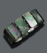 Shine from inside and out. Rainbows of purple, green and blue shimmer from this luminous bracelet of black Tahitian mother-of-pearl (15-20 mm). Stretches to fit wrist. Approximate length: 8 inches.