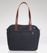 Classic navy canvas gets a handsome lift with smooth leather straps on this versatile Jade Spade tote.