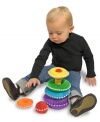 A spectrum of colors adorns this soft and safe stacking toy.  This set includes five multi-textured pieces, each of which rattle, jingle, squeak or crinkle, plus a color-coded stacking post.