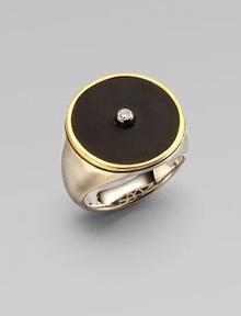 From the Nile Collection. A dramatic disc of black onyx is centered with one sparkling white topaz, framed in gleaming goldplate and set atop a brushed sterling silver band.Black onyx and white topazSterling silverGoldplatedDiameter, about ¾Imported