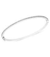 Shimmering and stunning. This stackable bangle bracelet, crafted from 14k white gold, sparkles with diamond accents. Approximate length: 7 inches. Approximate diameter: 2-1/3 inch x 2-1/8 inch.