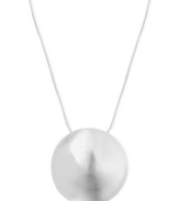 Rounding into shape, this pendant from Robert Lee Morris is crafted from silver-tone mixed metal and makes a subtle, yet fashionable statement. Approximate length: 18 inches + 3-inch extender. Approximate drop: 1-3/4 inches.