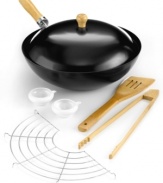 Wok out! Introduce authentic Asian flavor into your kitchen. This wok set includes the essentials-nonstick wok with lid, soy sauce pots, bamboo spoon and more-for whipping up a delicious stir fry with all the fixings. A great way to incorporate healthy cooking into your weekly menu. 1-month warranty.