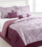 Purple passion. An enchanting pattern of floral medallions on a ground of tonal purple stripes renders a lustrous sheen in this jacquard woven Gallinda comforter set. Center panel is bordered on two sides by bands of solid purple and comforter reverses to an allover vertical stripe pattern. Shams, bedskirt and decorative pillows complete this captivating look.