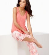 Dream in color. A watercolor-inspired print lends pretty appeal to these slinky capri-length pajama pants by Alfani.