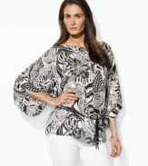 Rendered in airy satin-faced georgette, this petite boatneck blouse from Lauren by Ralph Lauren is tailored with breezy kimono sleeves for an elegant take on nautical style. (Clearance)