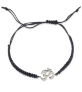 Look relaxed and resplendent. Single-cut diamonds (1/6 ct. t.w.) are set in YellOra™ and centered on a black parachute cord for a stunning effect. Bracelet adjusts to fit wrist. Approximate length: 11 inches.