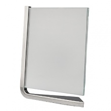 Movie vertical frames by Nambé. Designed by Neil Cohen for Nambé, these sleek metal frames feature a metal base and two squares of glass to protect your pictures. The movie frame is a wonderful gift for the home or office.