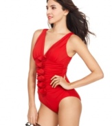 INC International Concepts' swimsuit offers tummy control draped in ruching and elegant ruffles. Wear with oversized sunglasses for a vintage-inspired, glamorous look!