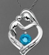 Nothing symbolizes love like a mother and child. This beautiful pendant features a round-cut blue topaz (5/8 ct. t.w.) and sparkling diamond accents. Crafted in sterling silver. Approximate length: 18 inches. Approximate drop: 1/2 inch.