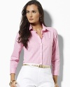 A classic-fitting Priya shirt, tailored for a flattering, feminine silhouette in lustrous wrinkle-free cotton sateen.