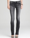 Bold studded back pockets and a hyper-modern grey wash add edge to these True Religion Becky straight-leg jeans.