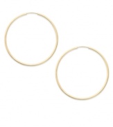 Forever stylish, forever chic. This pair of endless hoop earrings comes in 14k gold. Approximate diameter: 15 mm.