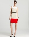 A refined take on color blocking, this kate spade new york shift dress jazzes up summer neutrals with a vibrant red stripe. Team with classic pumps for a look that goes from desk to drinks with ease.