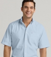 This simple button-down shirt from Tommy Hilfiger is the perfect complement to patterned shorts.