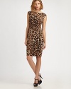 Wildly flattering, featuring an exotic leopard print and an alluring cutout back detail.BoatneckSleevelessSide gathersBack cutout with hook-and-eye closureFully linedAbout 24 from natural waistPolyesterDry cleanMade in USA of imported fabricModel shown is 5'10 (177cm) wearing US size 4. 