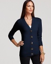 Add pop to basics with a casual-luxe Tory Burch cardigan, featuring golden logo buttons and a flattering slim silhouette.