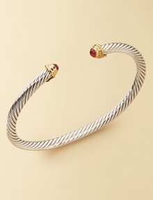 From The Cable Kids Collection. A charming sterling silver cable with ruby end caps set in 18k gold. Ruby Sterling silver and 18k yellow gold Cable, 4mm Diameter, about 2 Made in USA