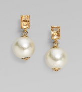 Lustrous faux pearls dangle from glowing clear beads in these classic yet fun drops.Acrylic and epoxy 12k goldplated Drop, about 1 Post back Imported