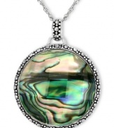 Inspire your look with ocean color. Genevieve & Grace's pretty pendant features round-cut abalone glass and glittering marcasite. Set in sterling silver. Approximate length: 18 inches. Approximate drop: 1-5/8 inches.