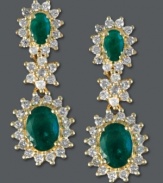 Don't be afraid to dazzle. Effy Collection's beautifully-crafted drop earrings incorporate oval-cut emeralds (2 ct. t.w.) and diamonds (7/8 ct. t.w.) in a polished, 14k gold post setting. Approximate drop length: 1 inch.