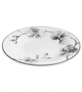 Compose a striking arrangement with the Black Orchid tidbit plate by Michael Aram. Fine white Limoges porcelain flourishes under a dark watercolor motif inspired by foliage from around the world.