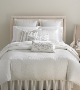 The Shimmer European sham from Martha Stewart Collection features an attractive blossom jacquard pattern over a silvery ombré ground. Soft piping completes this elegant design.