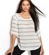 Casual doesn't have to mean you compromise on style. INC's sweater features a fabulous fit and striking metallic stripes.