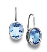 Cool blues. Add a pastel pop to your look with stunning oval-cut blue topaz (20 ct. t.w.) drop earrings. Set in sterling silver. Approximate drop: 1-1/10 inches.