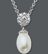 Sweet sophistication. Round-cut white topaz (6-1/2 ct. t.w.) and a cultured freshwater pearl (8 mm x 12 mm) form an elegant shape on this sterling silver drop pendant. Approximate length: 18 inches. Approximate drop: 9/10 inch.