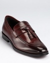 Sleek dress loafers crafted in burnished Italian leather and finished with a double tassel detail at the tongue.