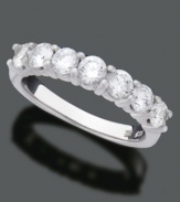 This 14k white gold ring with seven round-cut diamonds (1 ct. t.w.) is the perfect way to commemorate your anniversary.