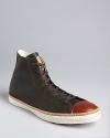 A color-block high-top in leather with an antique, vintage vibe expresses your appreciation for classic designs.