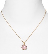 This haute bohemian pendant necklace from Coralia Leets charms with rich texture and hue. The gleaming gold setting sets off a rose quartz stone.