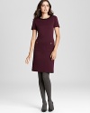 Ripe for fall, a richly-hued Tory Burch sheath dress stuns with an impeccably tailored silhouette.